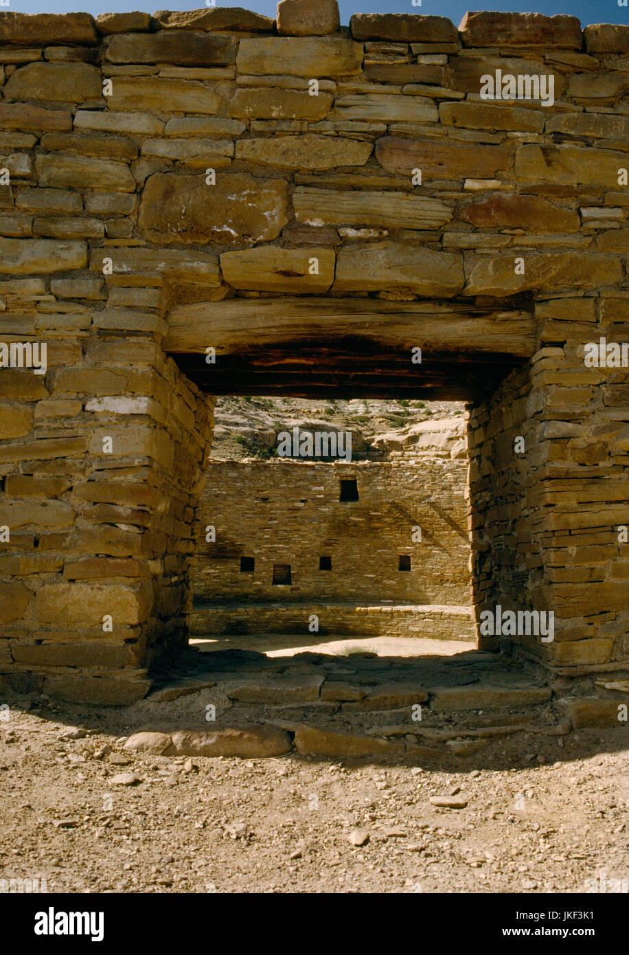 Interior of Casa Riconada great kiva Chaco Canyon, New Mexico; looking into the semi subterranean structure through the window on the north east. Stock Photo