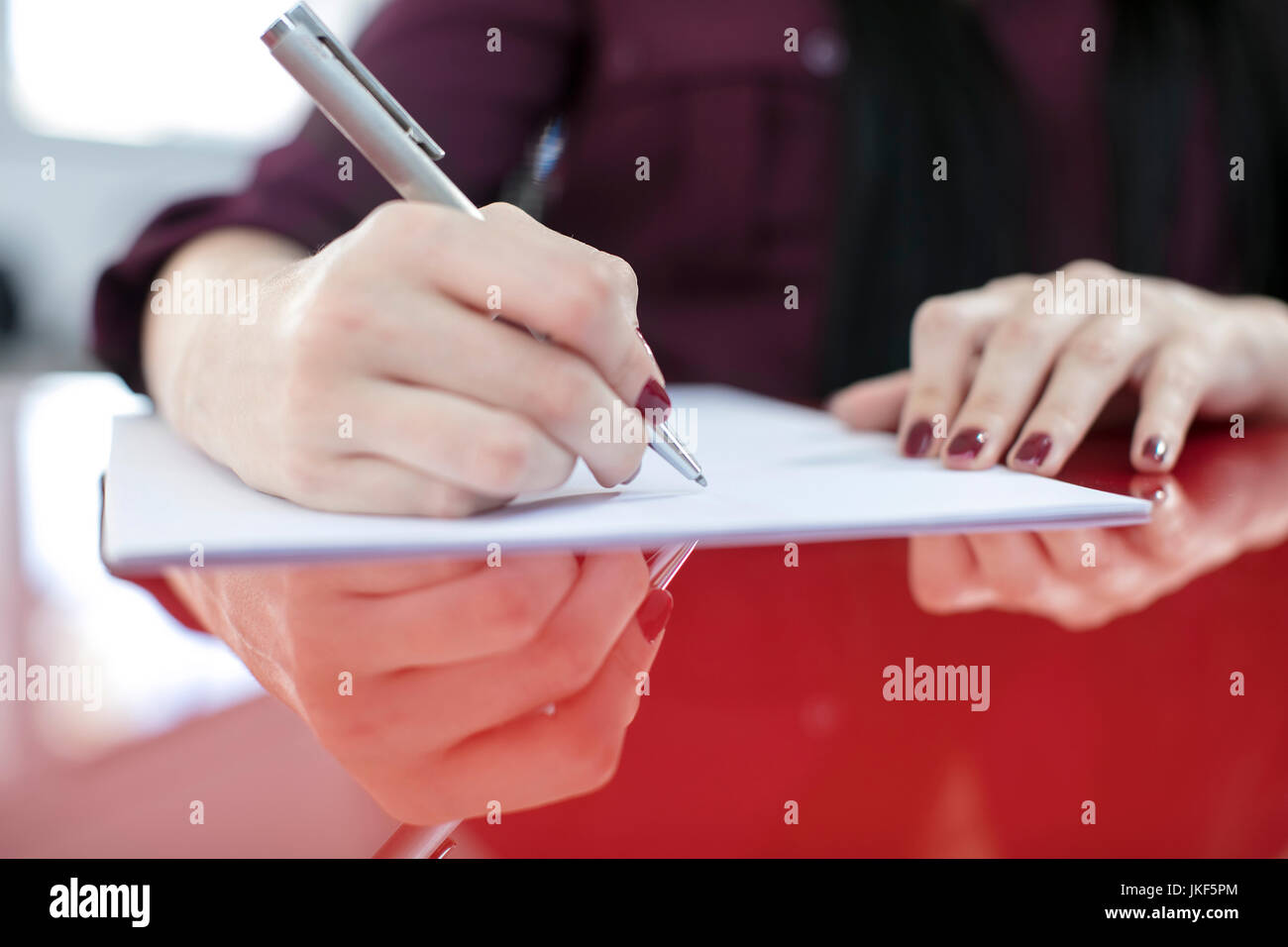 Female hands writing a letter Stock Photo