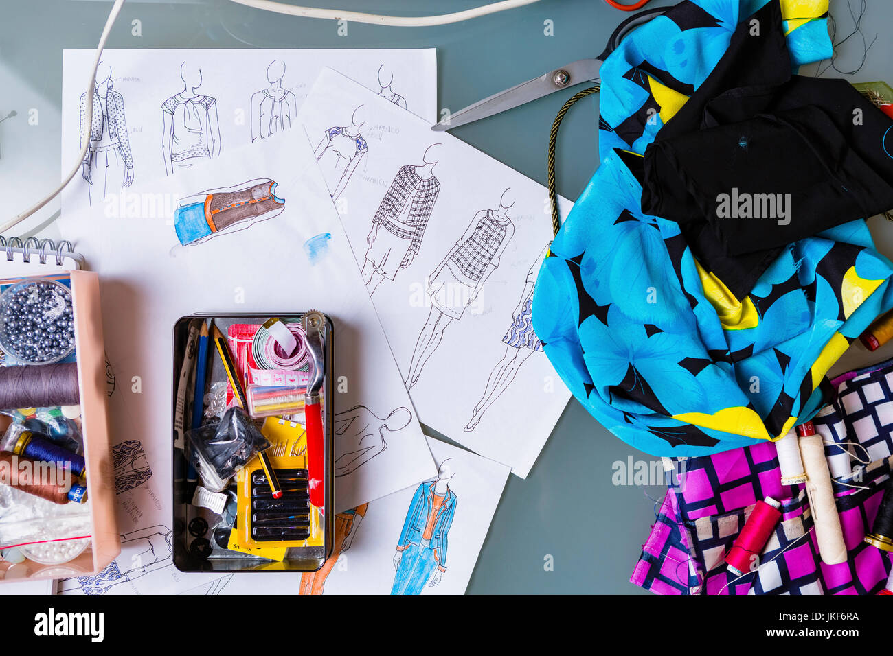 Equipment and sketches of fashion designer Stock Photo Alamy