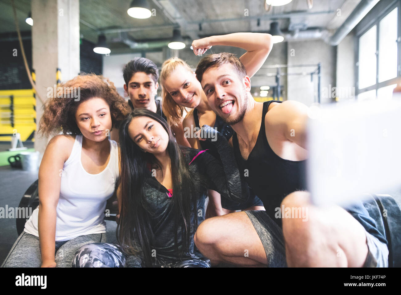 Group people posing in hi-res stock photography and images - Alamy