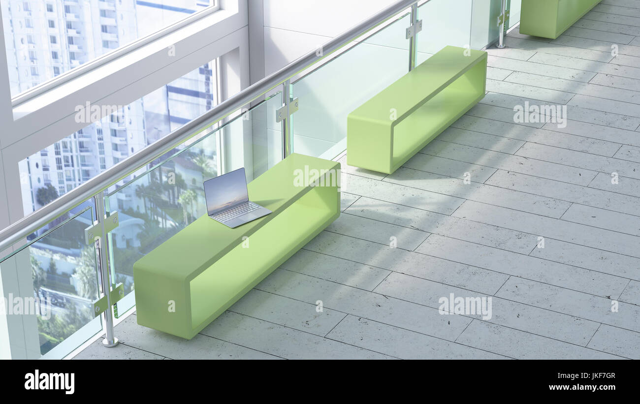 Modern waiting area with laptop on bench Stock Photo - Alamy