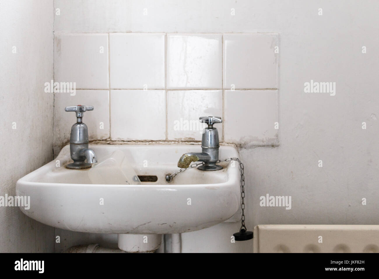 water basin with separate hot and cold water taps as used in Britain Stock Photo Alamy