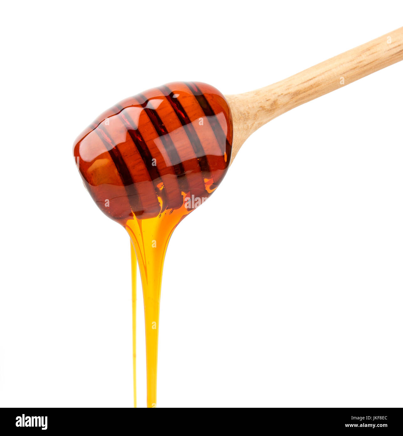Honey stick isolated on white Stock Photo