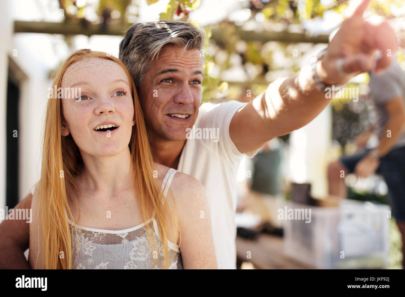 Father Showing Something To Daughter Outdoors Stock Photo - Alamy