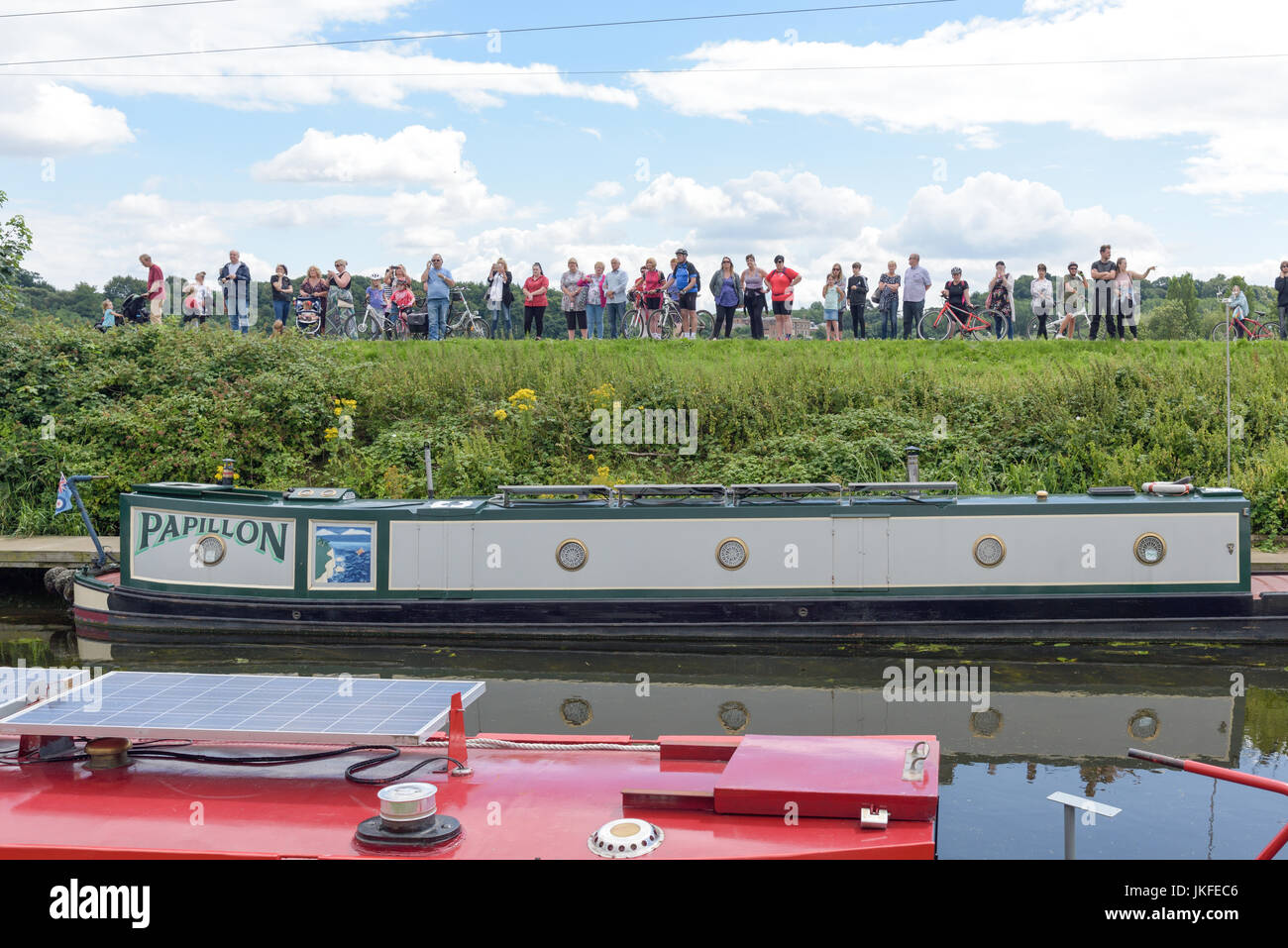 Beeston, Nottinghamshire, UK. 23rd July 2017. Nottinghamshire bikers’ group, Nottz Bikerz held a charity motorcycle run for Owen Jenkins.Owen drowned in the river Trent trying to save a young girl who was in trouble in the water.Thousands of motorcyclist turn up along with members of the public and Owens family members.Public line the banks of the river Trent. Credit: Ian Francis/Alamy Live News Stock Photo