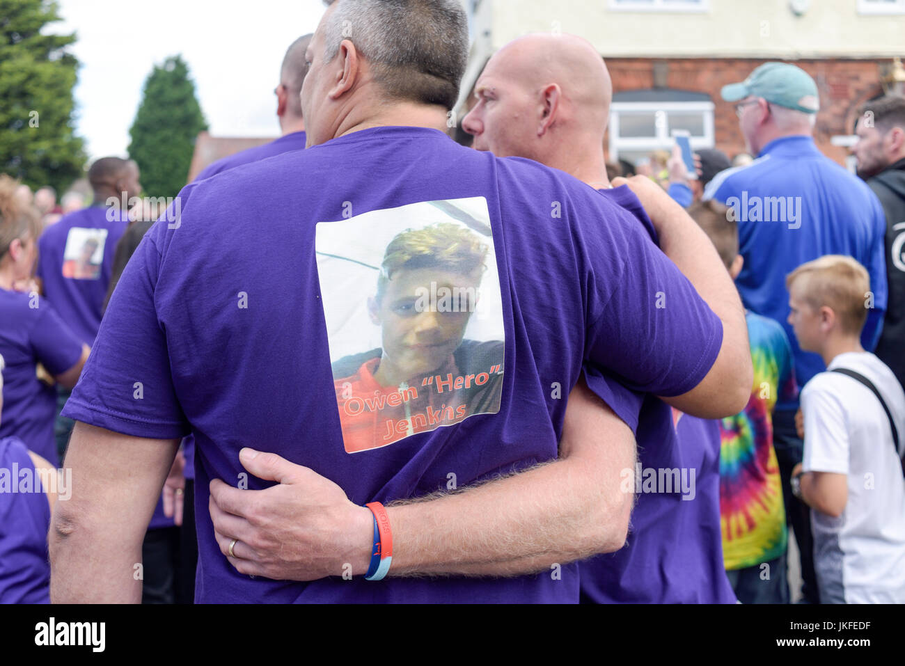 Beeston, Nottinghamshire, UK. 23rd July 2017. Nottinghamshire bikers’ group, Nottz Bikerz held a charity motorcycle run for Owen Jenkins.Owen drowned in the river Trent trying to save a young girl who was in trouble in the water.Thousands of motorcyclist turn up along with members of the public and Owens family members.Owen's family lead parade all wearing purple his favourite colour. Credit: Ian Francis/Alamy Live News Stock Photo