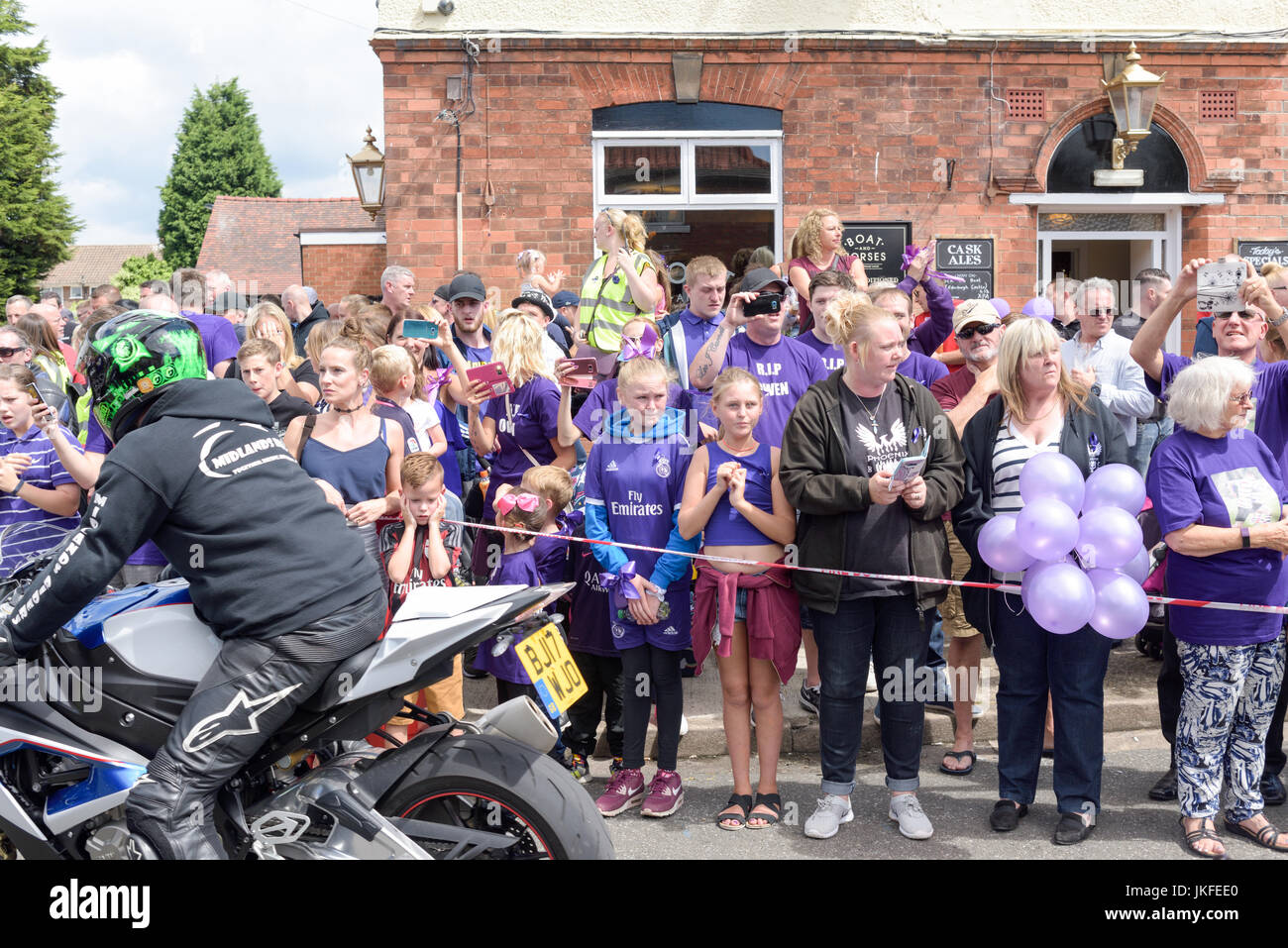 Beeston, Nottinghamshire, UK. 23rd July 2017. Nottinghamshire bikers’ group, Nottz Bikerz held a charity motorcycle run for Owen Jenkins.Owen drowned in the river Trent trying to save a young girl who was in trouble in the water.Thousands of motorcyclist turn up along with members of the public and Owens family members. Credit: Ian Francis/Alamy Live News Stock Photo