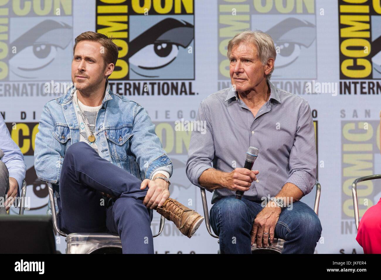 July 22, 2017 - San Diego, US - Day three in Hall H. .Blade Runner 2049, Alcon Entertainment's sequel to the cult classic, which takes us 30 more years into the future, with stars Ryan Gosling and Harrison Ford as well as Ana de Armas, Sylvia Hoeks, Robin Wright, Lennie James, and Mackenzie Davis, writers Hampton Fancher and Michael Green, and the film's director, Denis Villeneuve.Seen here: Ryan Gosling and Harrison Ford (Credit Image: © Daren Fentiman via ZUMA Wire) Stock Photo