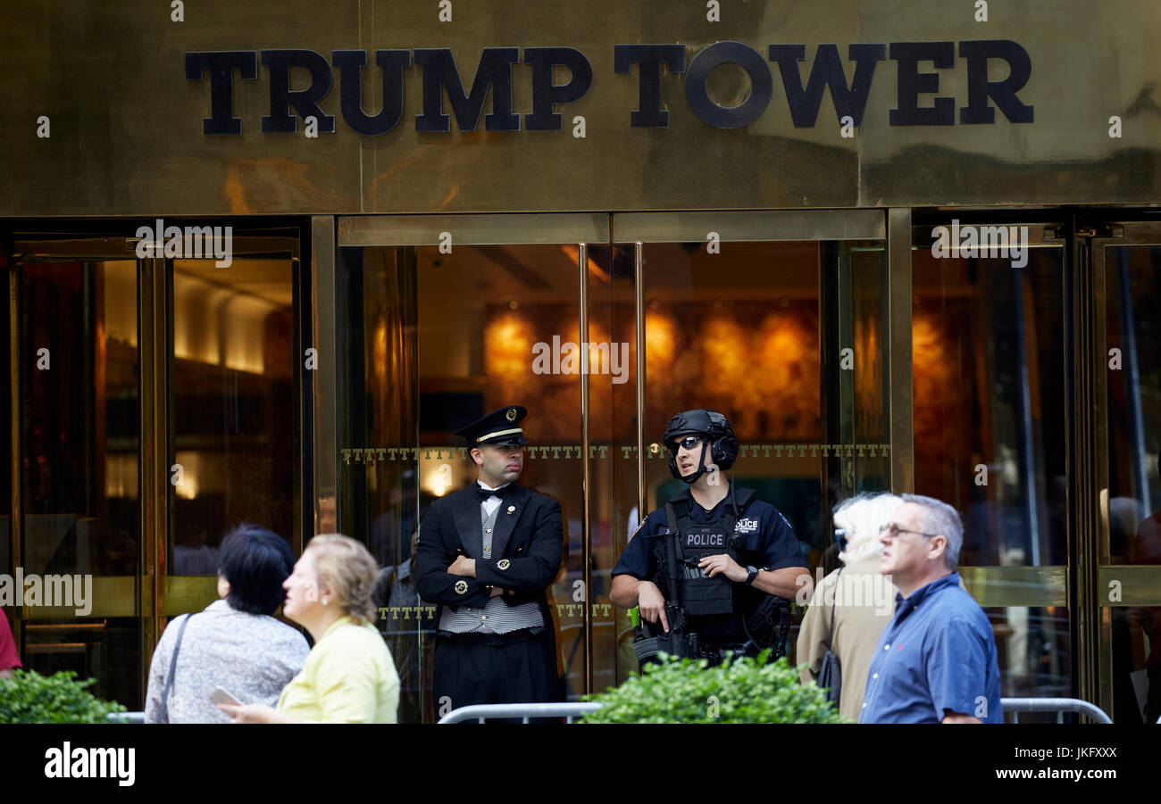 New York City, Manhattan, Armed police and doorman at Trump Tower doorway on 5th Avenue Stock Photo