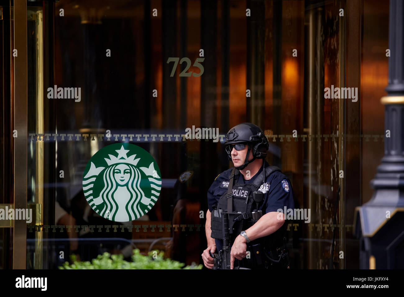 New York City, Manhattan, Armed police and doorman at Trump Tower doorway on 5th Avenue Stock Photo