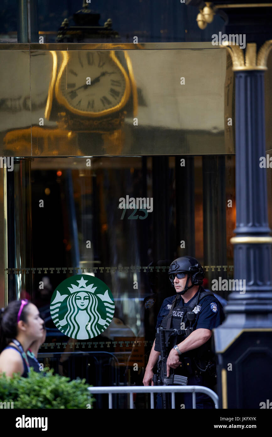 New York City, Manhattan, Armed police and doorman at Trump Tower doorway on 5th Avenue Stock Photo