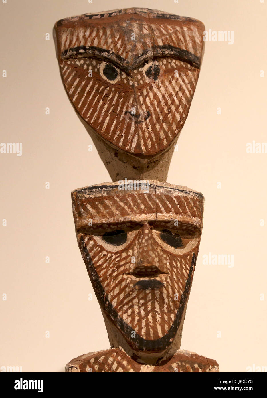 Funerary pole with Purukuparli and his son Jinani (detail). Carved and painted wood. 20th Century, Tiwi, Melville Island, Northen Australia. Stock Photo