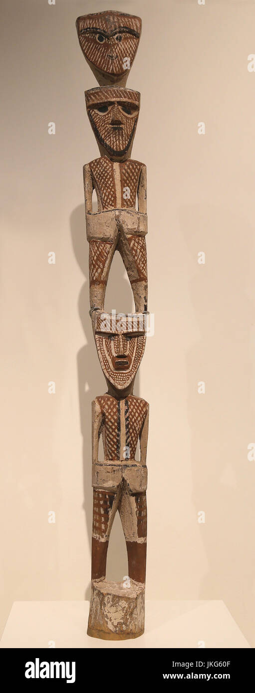 Funerary pole with Purukuparli and his son Jinani. Carved and painted wood. 20th Century, Tiwi, Melville Island, Northen Australia. Stock Photo