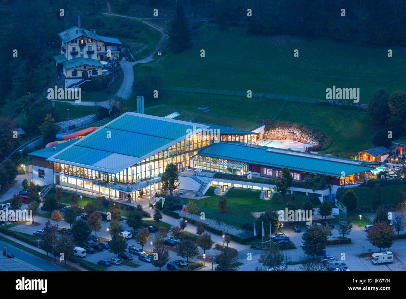 Germany, Bavaria, Berchtesgaden, elevated view of the Watzmann Therme water park, dusk Stock Photo