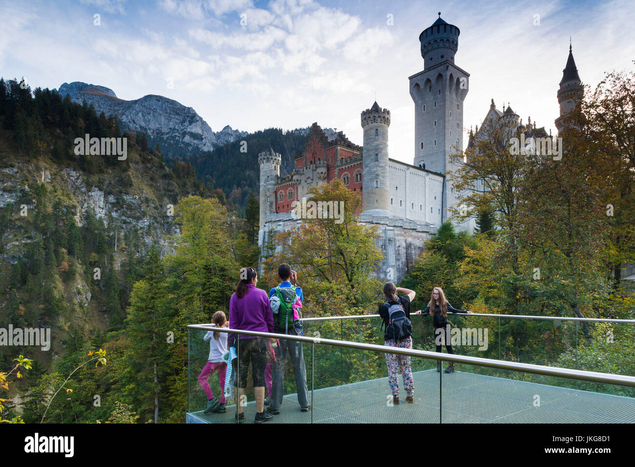 Germany, Bavaria, Hohenschwangau, Schloss Neuschwanstein castle, tourists at observation platform Stock Photo