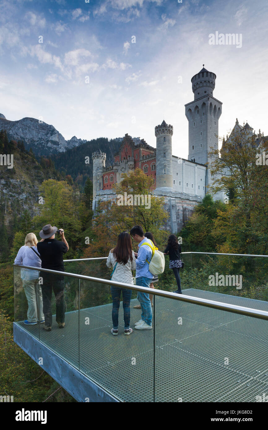 Germany, Bavaria, Hohenschwangau, Schloss Neuschwanstein castle, tourists at observation platform Stock Photo