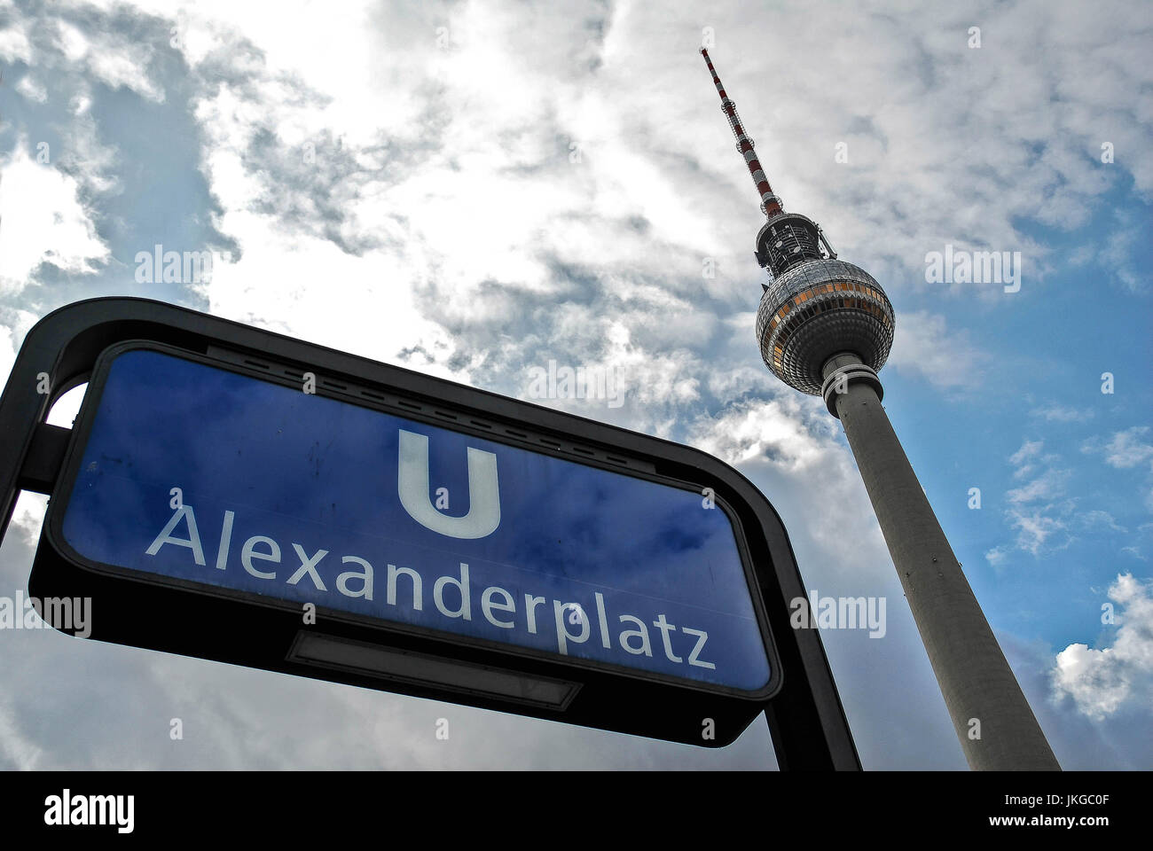 BERLIN-APRIL 4:Alexanderplatz U-bahn station sign and Berlin tv tower in Berlin,Germany, on April 4,2011. Stock Photo