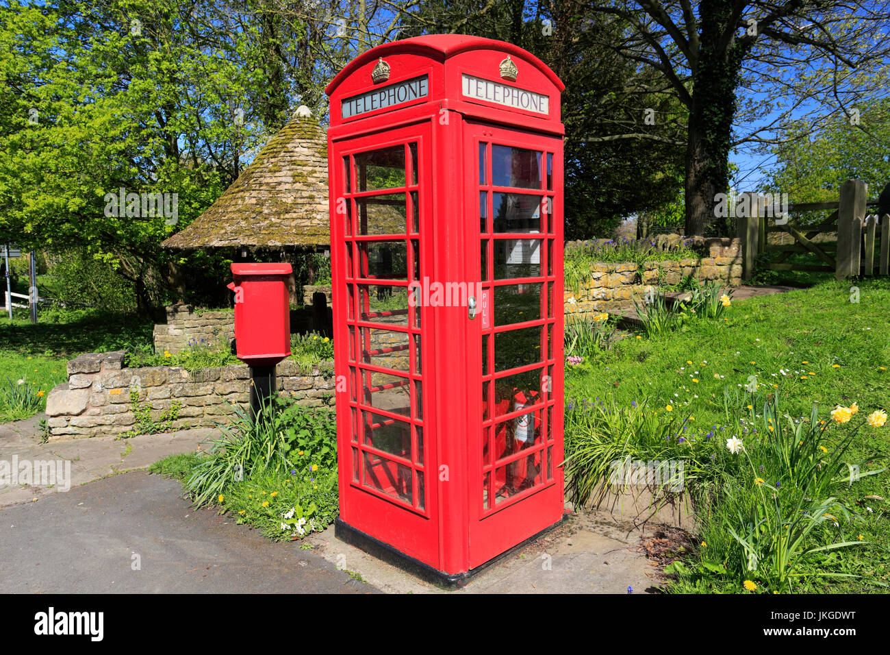 Red phone box and wooden stocks hires stock photography and images Alamy