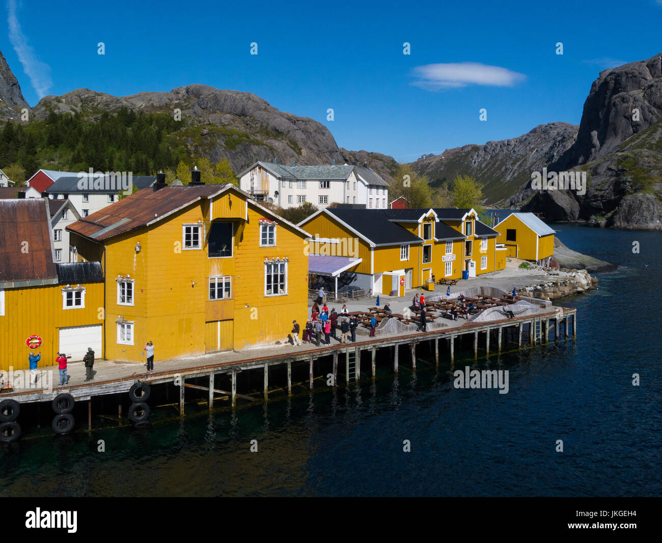 Looking down on Nusfjord harbour in old preserved fishing village now a museum and holiday resort from viewpoint above harbour  Flakstadøy one of main Stock Photo