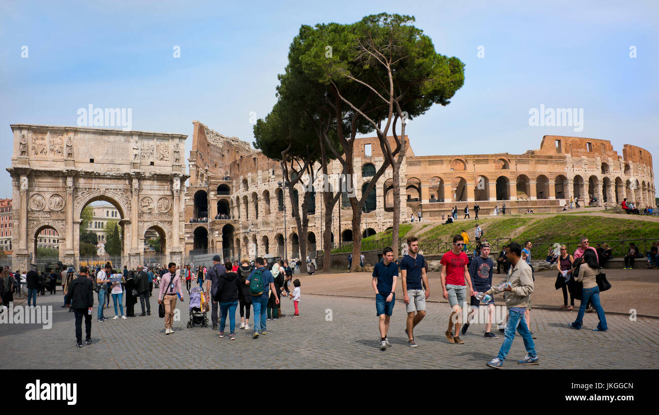 Horizontal panoramic cityscape view of the Arch of Constantine and the Colosseum in Rome. Stock Photo