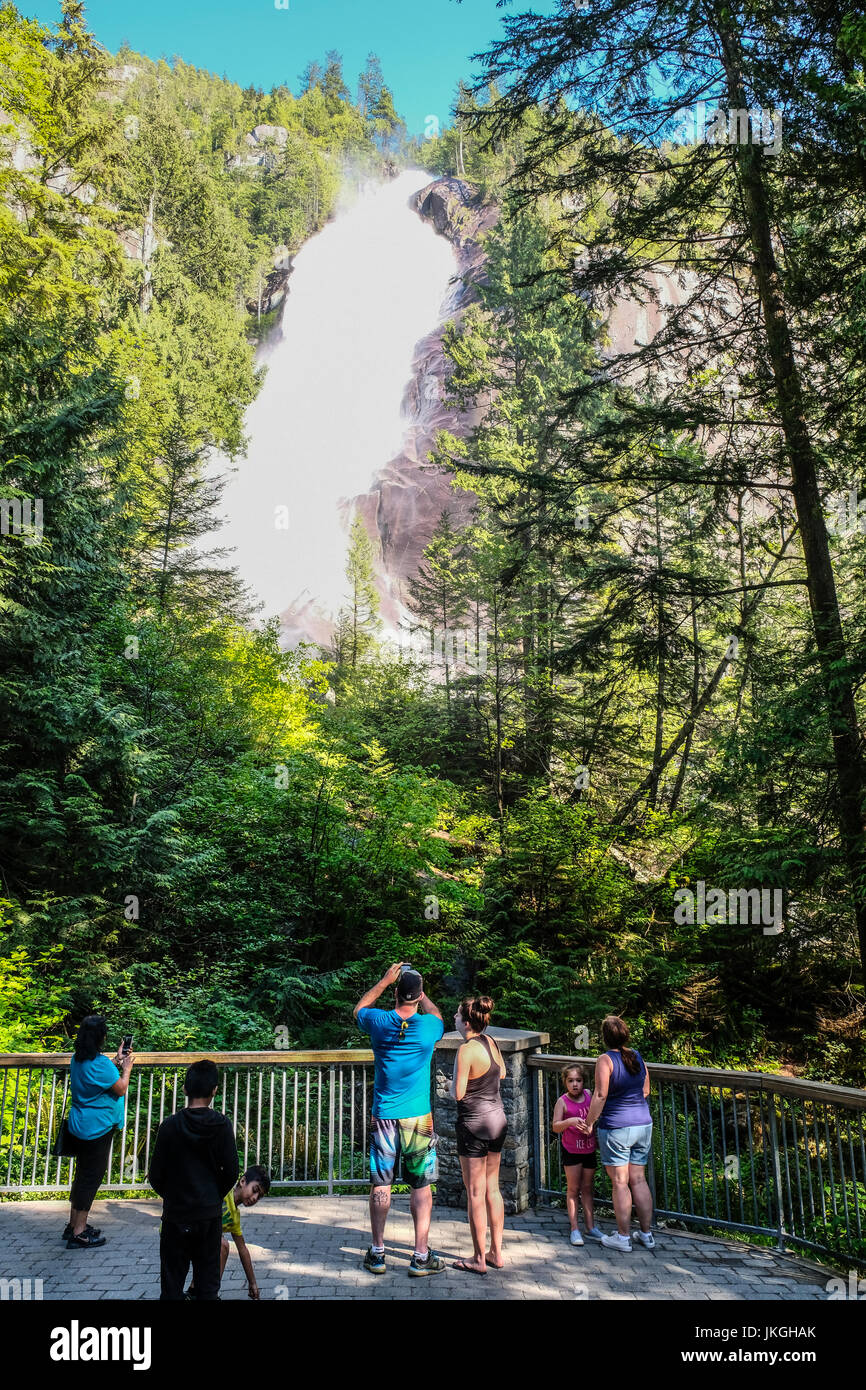 Tourists taking pictures at the Bridal Veil Falls at British Columbia, Canada Stock Photo