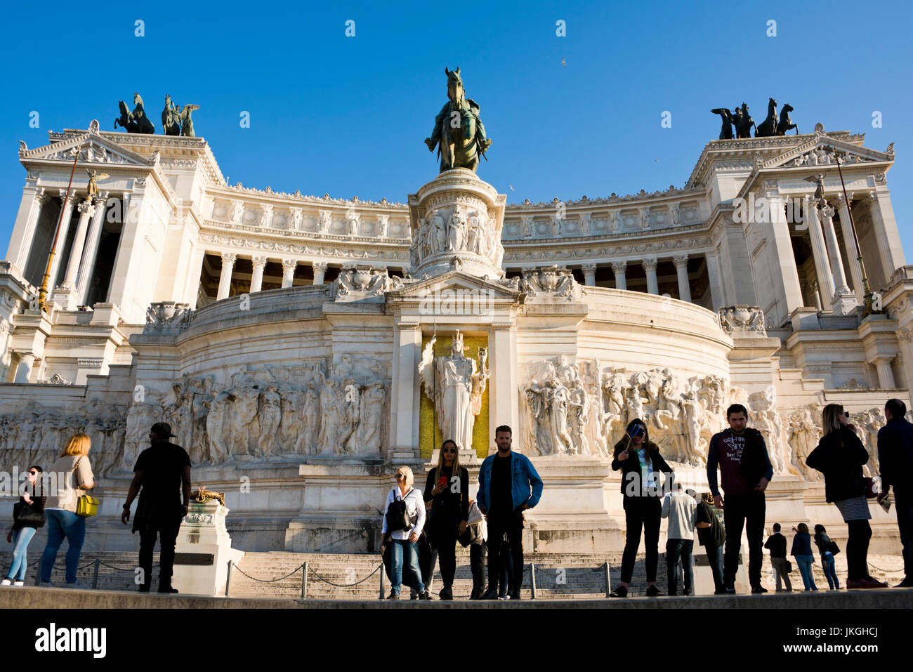Horizontal view of people at the top of the Vittoriano or Victor Emanuele II monument in Rome. Stock Photo