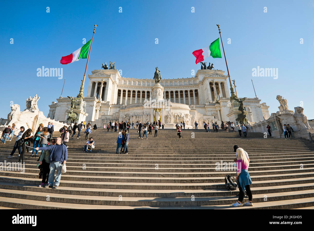 Horizontal view of people climbing the stairs at the Vittoriano or Victor Emanuele II monument in Rome. Stock Photo