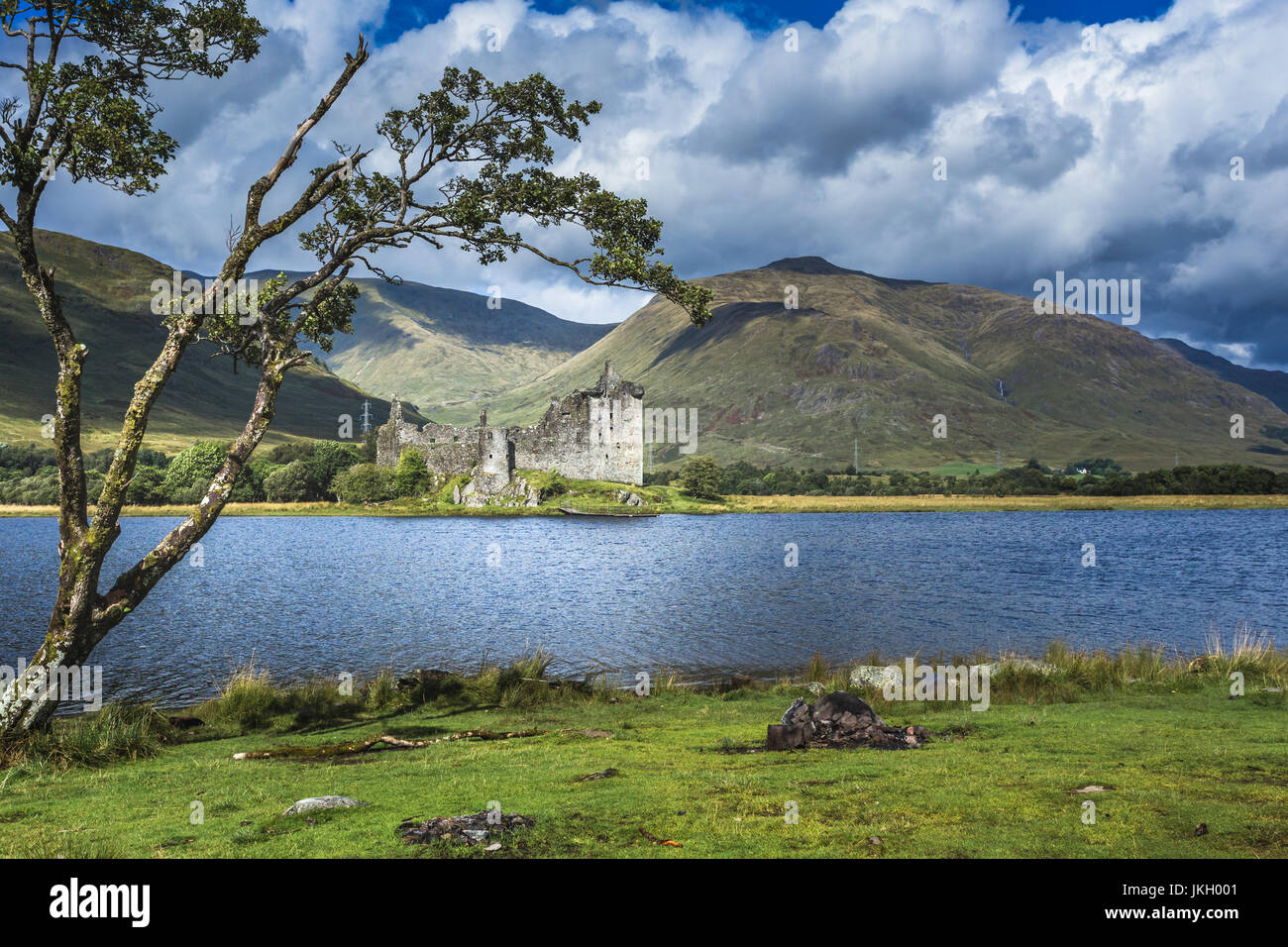 The ruin of Kilchurn Castle and mountains reflecting off Loch Awe, highlands,Scotland Stock Photo