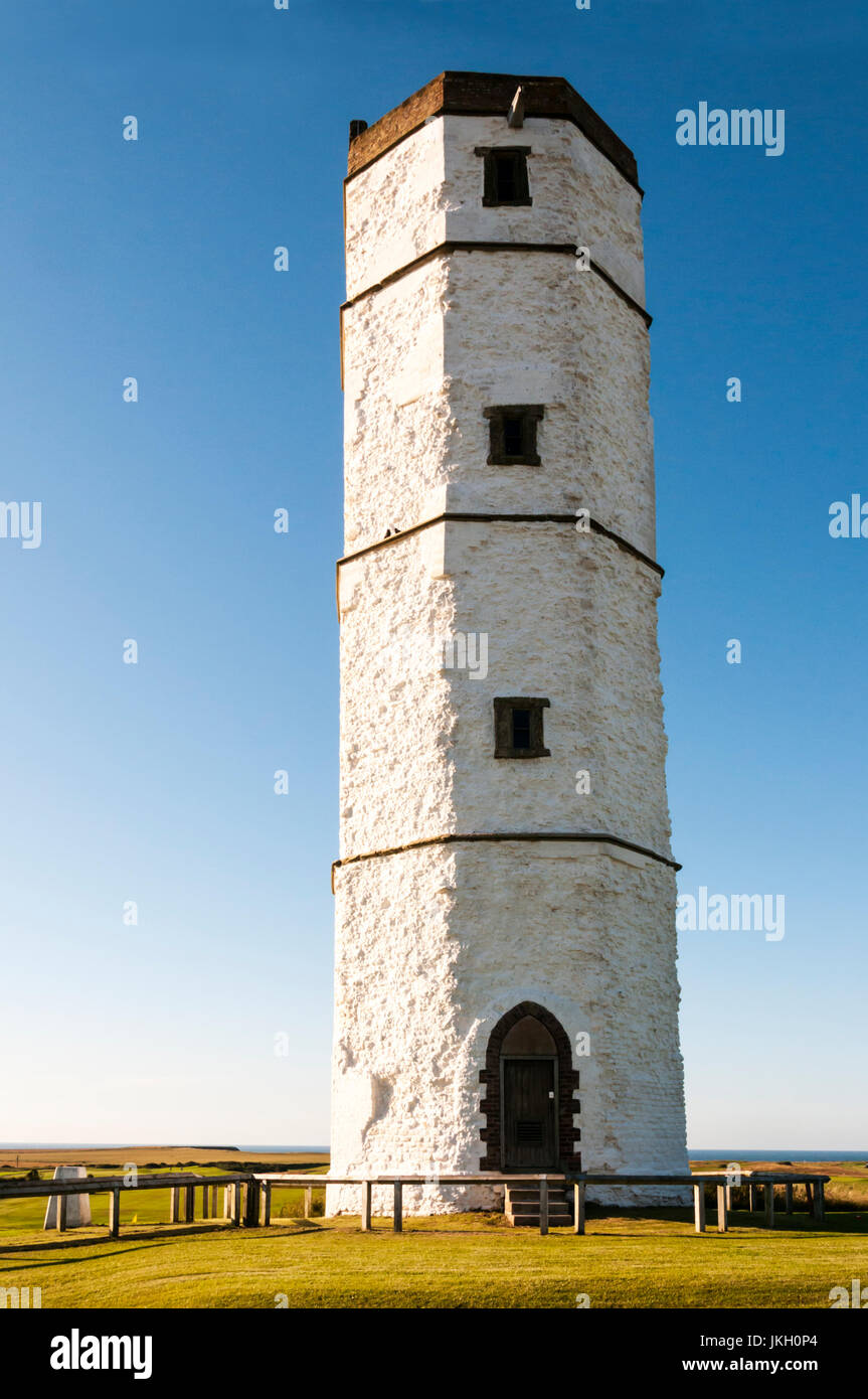 The chalk tower at Flamborough Head was built in 1674 as a lighthouse.  Its main use however was as a visible coastal beacon and a signalling tower. Stock Photo