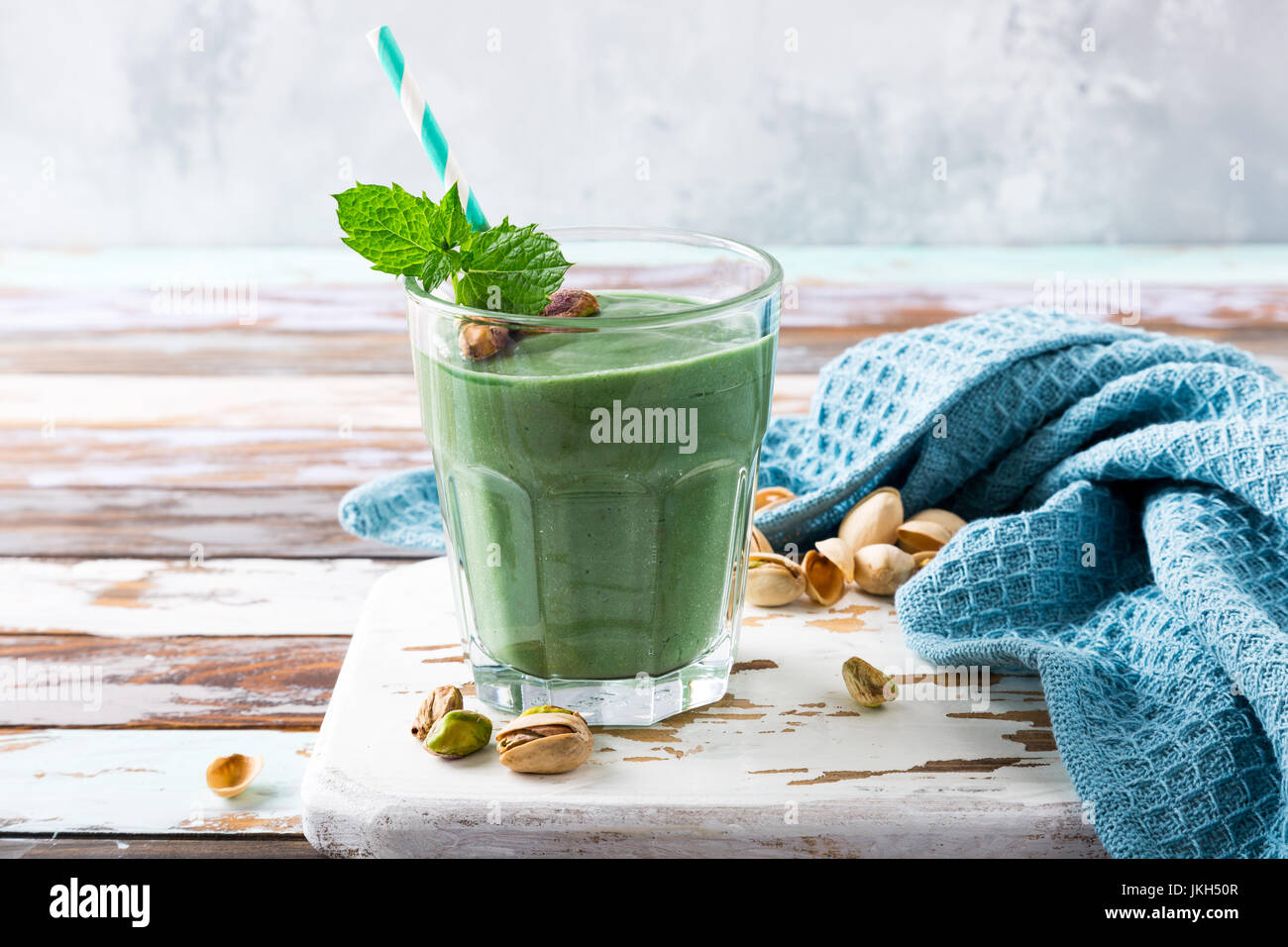 Healthy green smoothie with mint and pistachios Stock Photo - Alamy