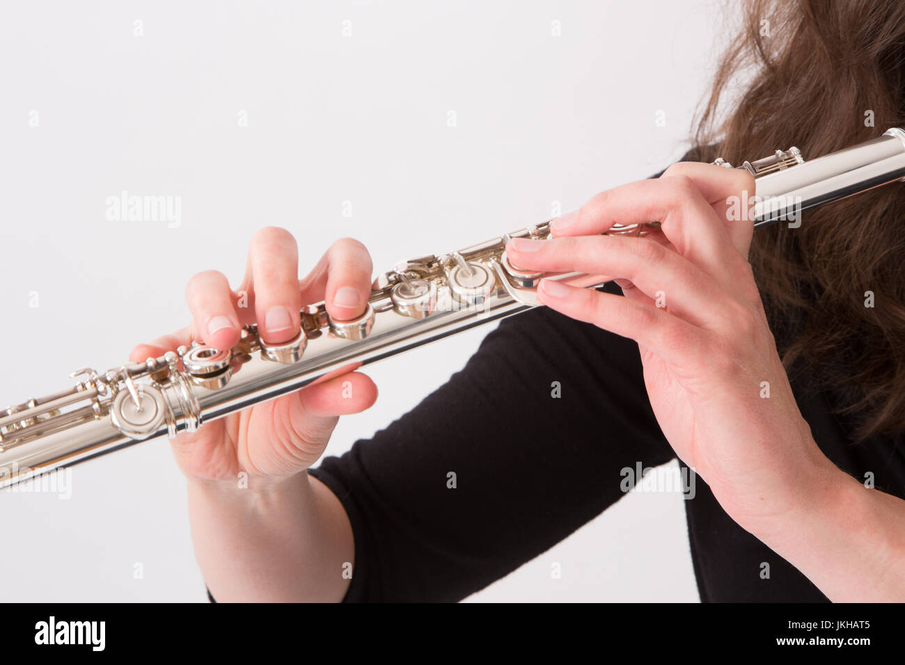 musicians hands playing a flute Stock Photo Alamy
