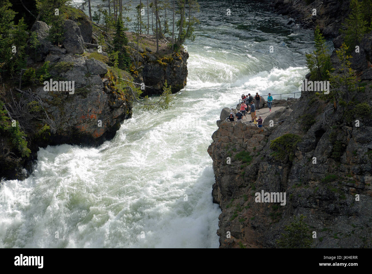 Visitors on top of the Upper fall, Yellowstone National Park, Wyoming, USA Stock Photo