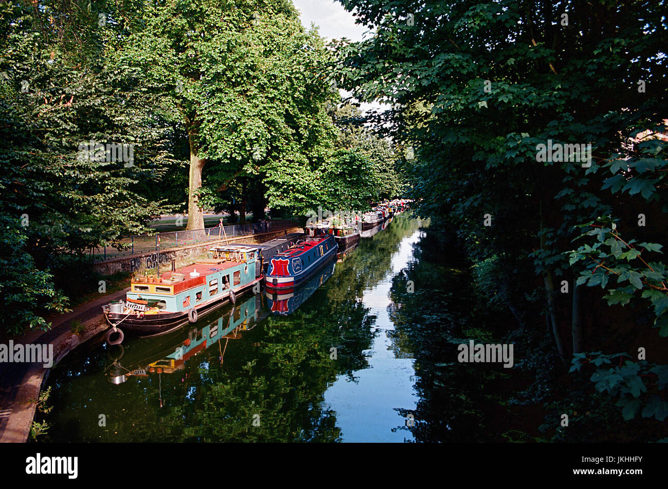 The Regents Canal at Victoria Park, Bow, in London's East End, with narrowboats Stock Photo