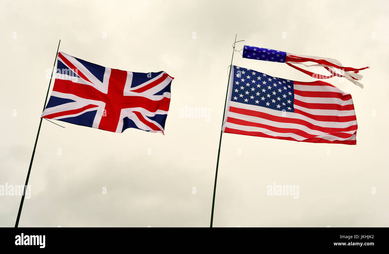 Union Jack flag and the stars and stripes of the USA flying together over Kingsley, near Bordon, Hampshire, UK. 15 July 2017. Stock Photo