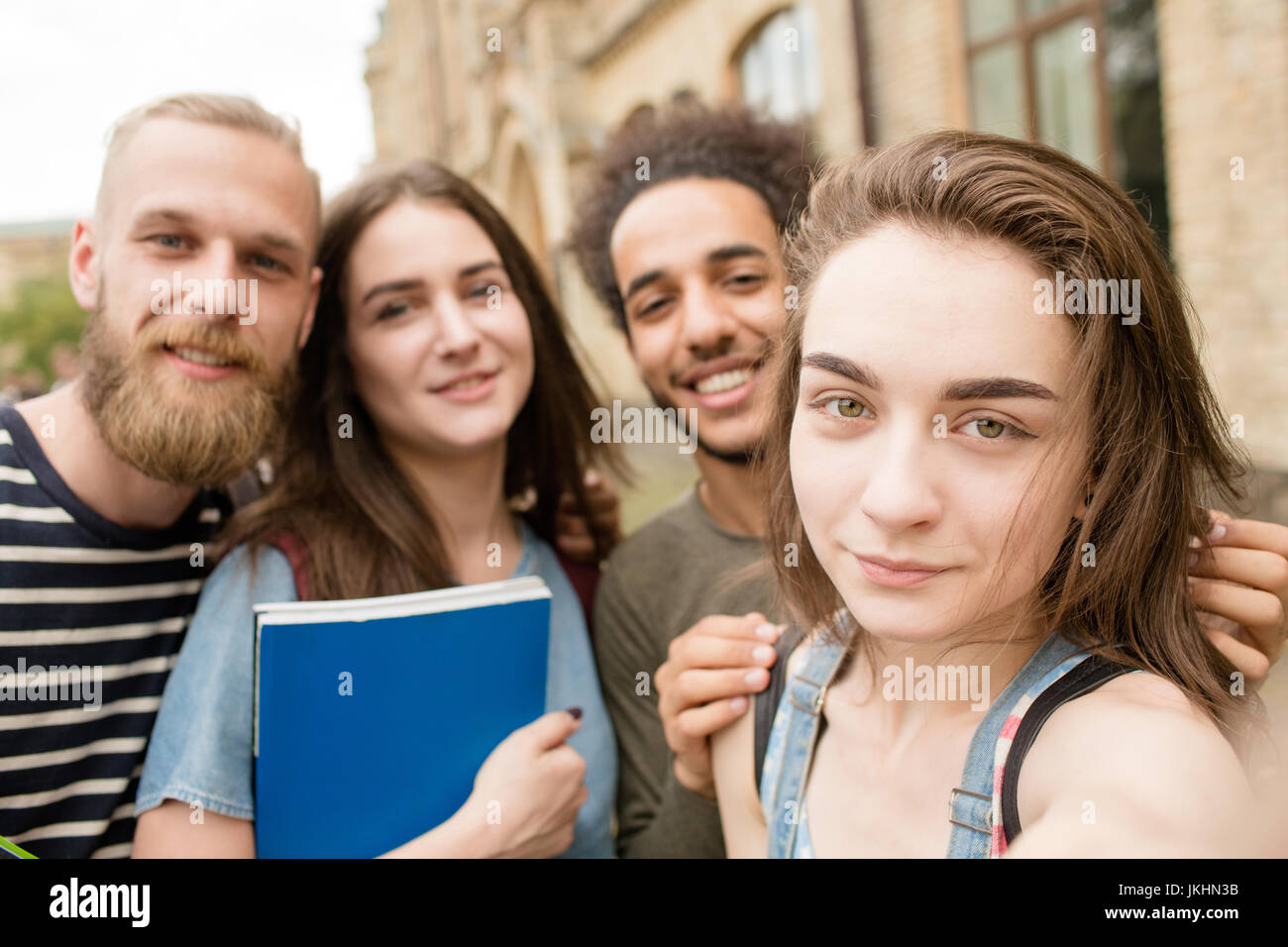 Multiethnic students smiling for selfie photo Stock Photo - Alamy
