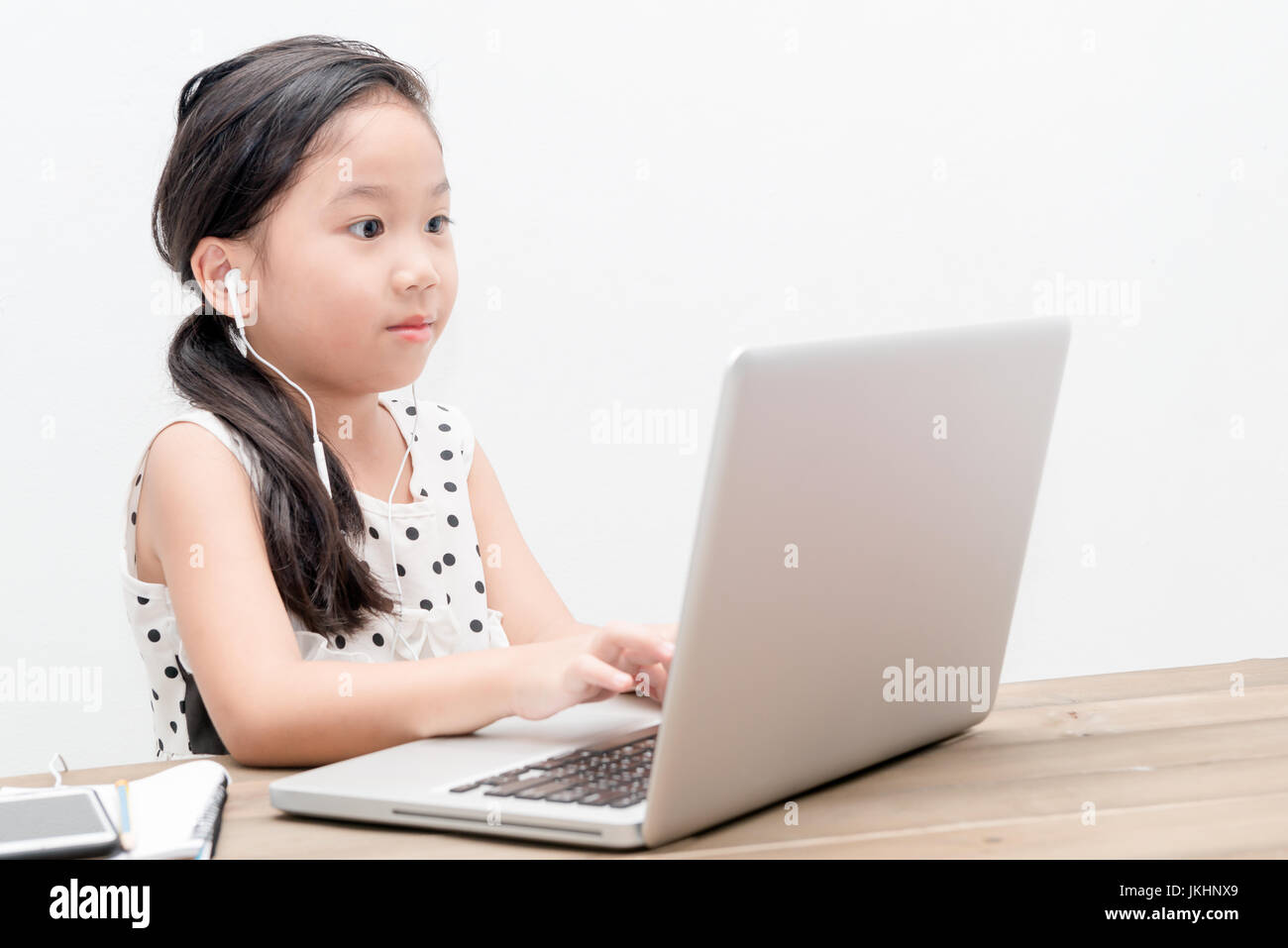 education, technology and internet concept - cute student girl with ...