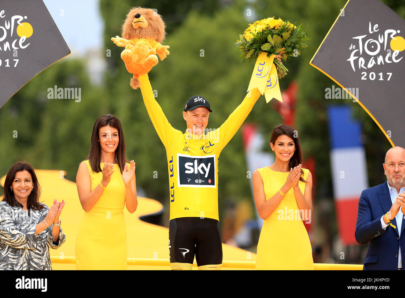 Team Sky's Chris Froome celebrates on the podium after stage 21 of the Tour de France in Paris, France. Stock Photo