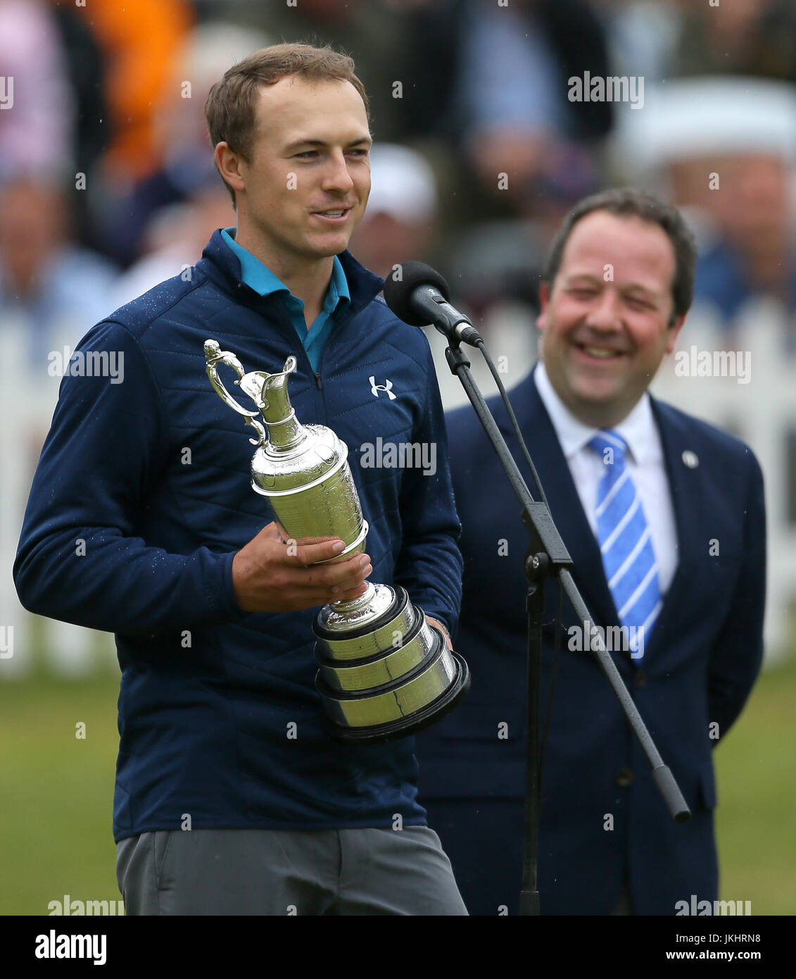 usa-s-jordan-spieth-is-presented-with-the-claret-jug-after-winningthe