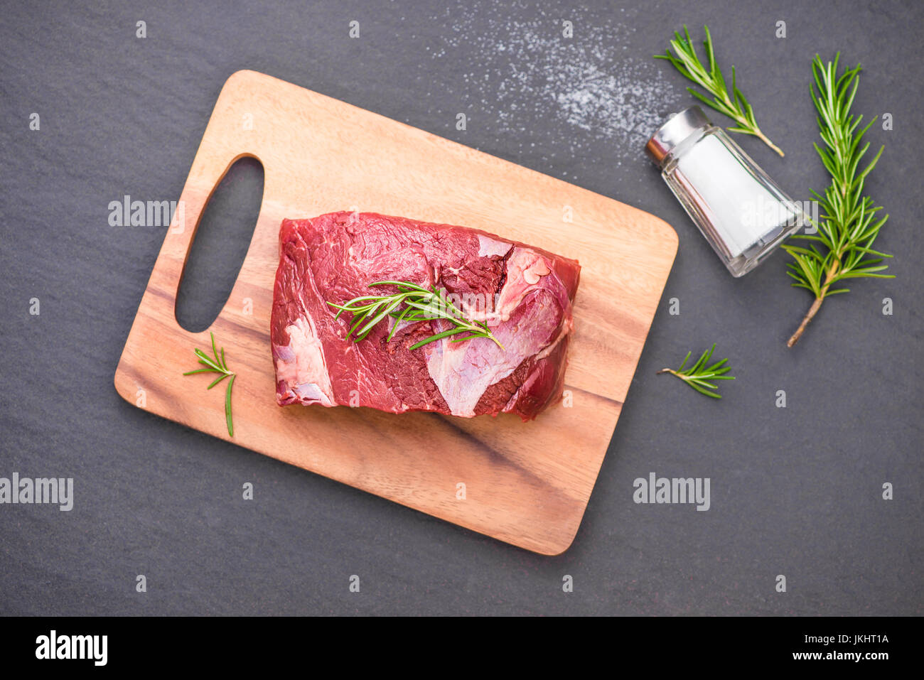 Raw beef cooking with ingredients. Top view with copy space Stock Photo