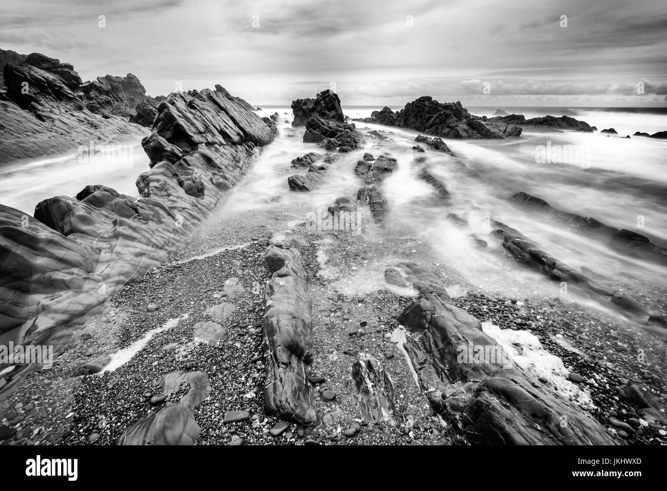 Rock formations on beach in Cornwall Stock Photo - Alamy