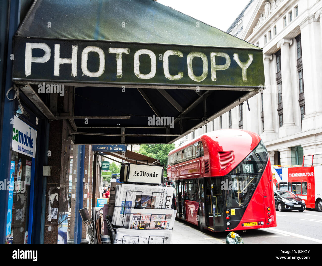 Exterior of a newsagents with a large 'Photocopy' awning over the main entrance Stock Photo