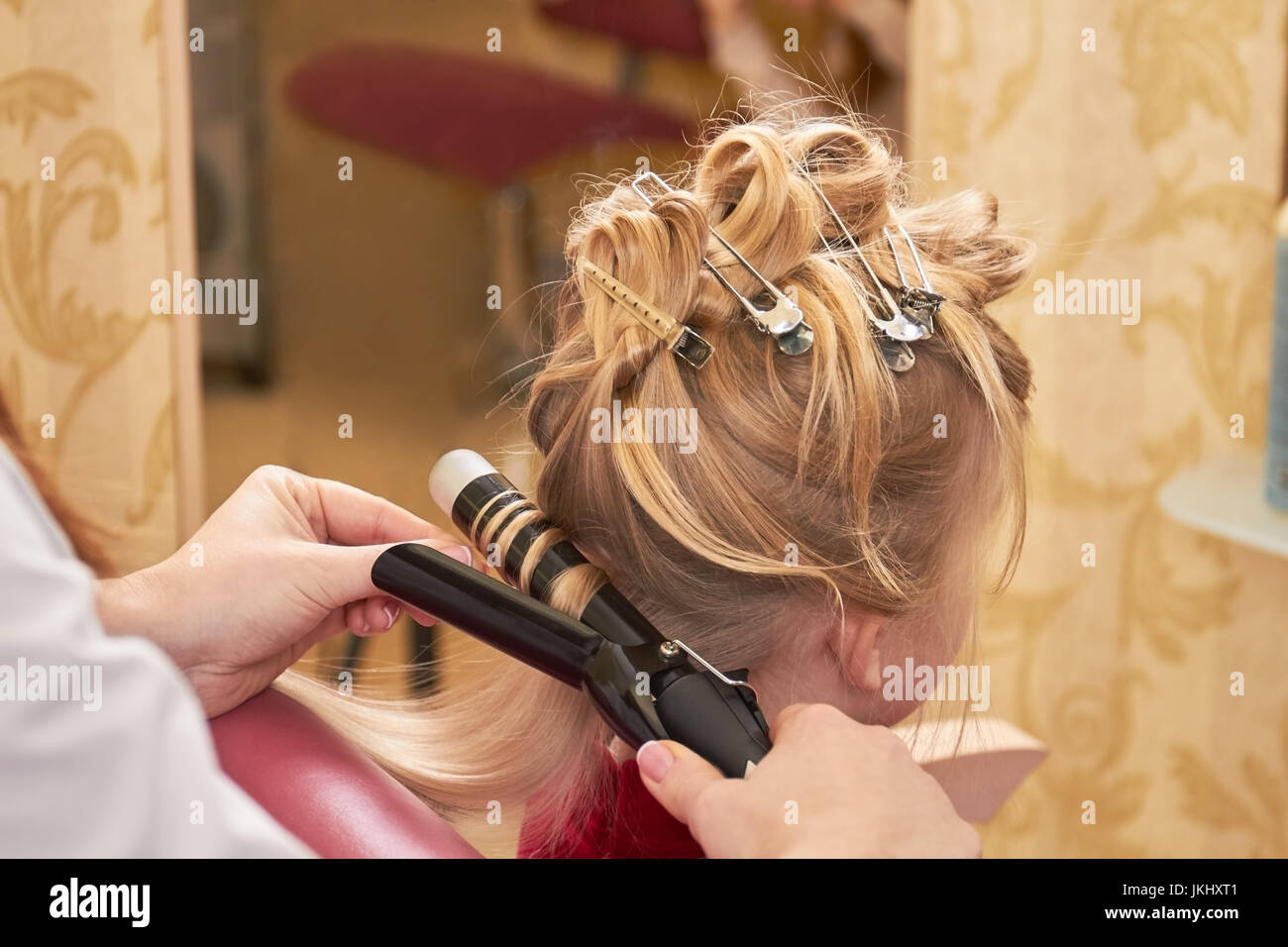 Hairdo of little girl. Stock Photo
