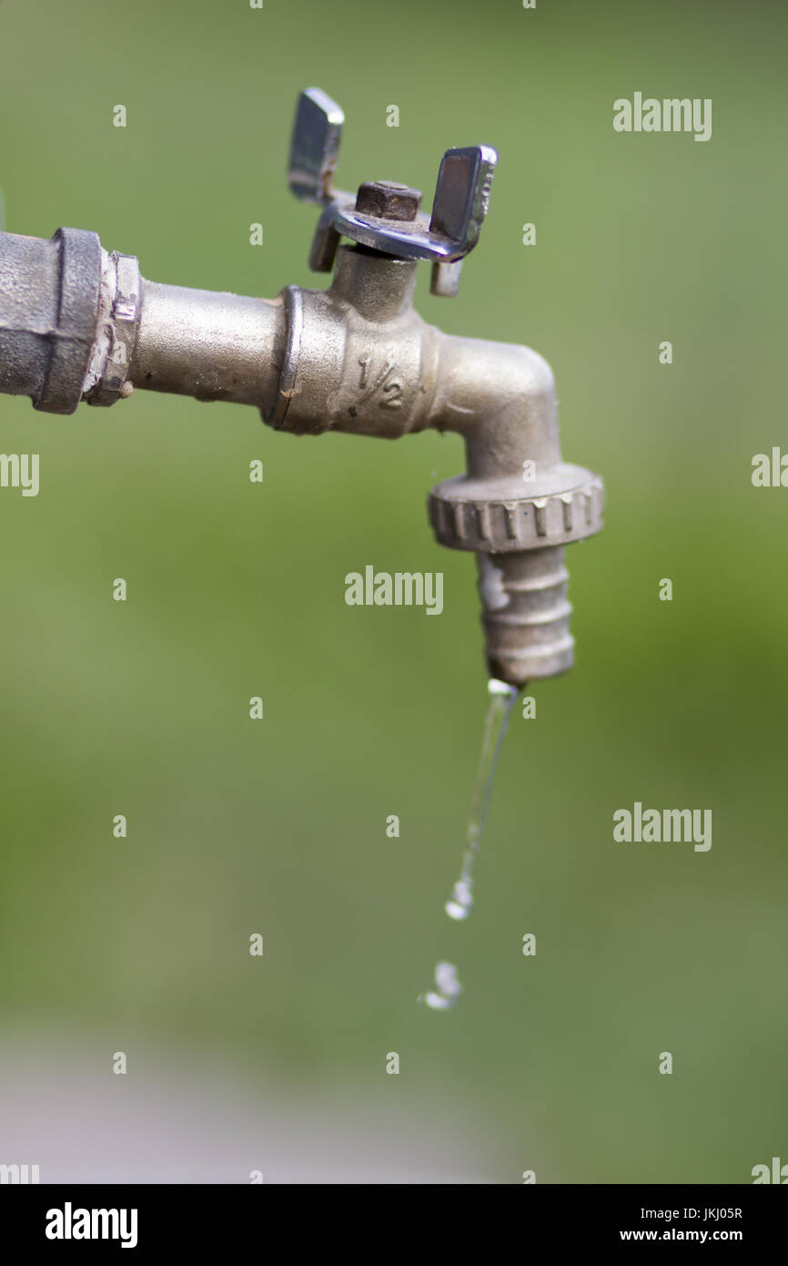 drain water from the tap Metal outdoors Stock Photo Alamy