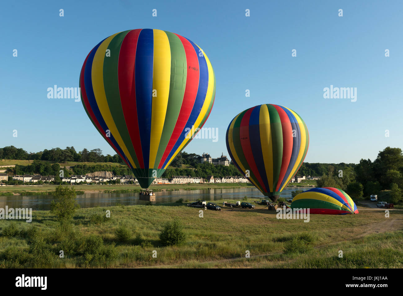 striped hot air baloons in front of chaumont sur loire, france Stock Photo