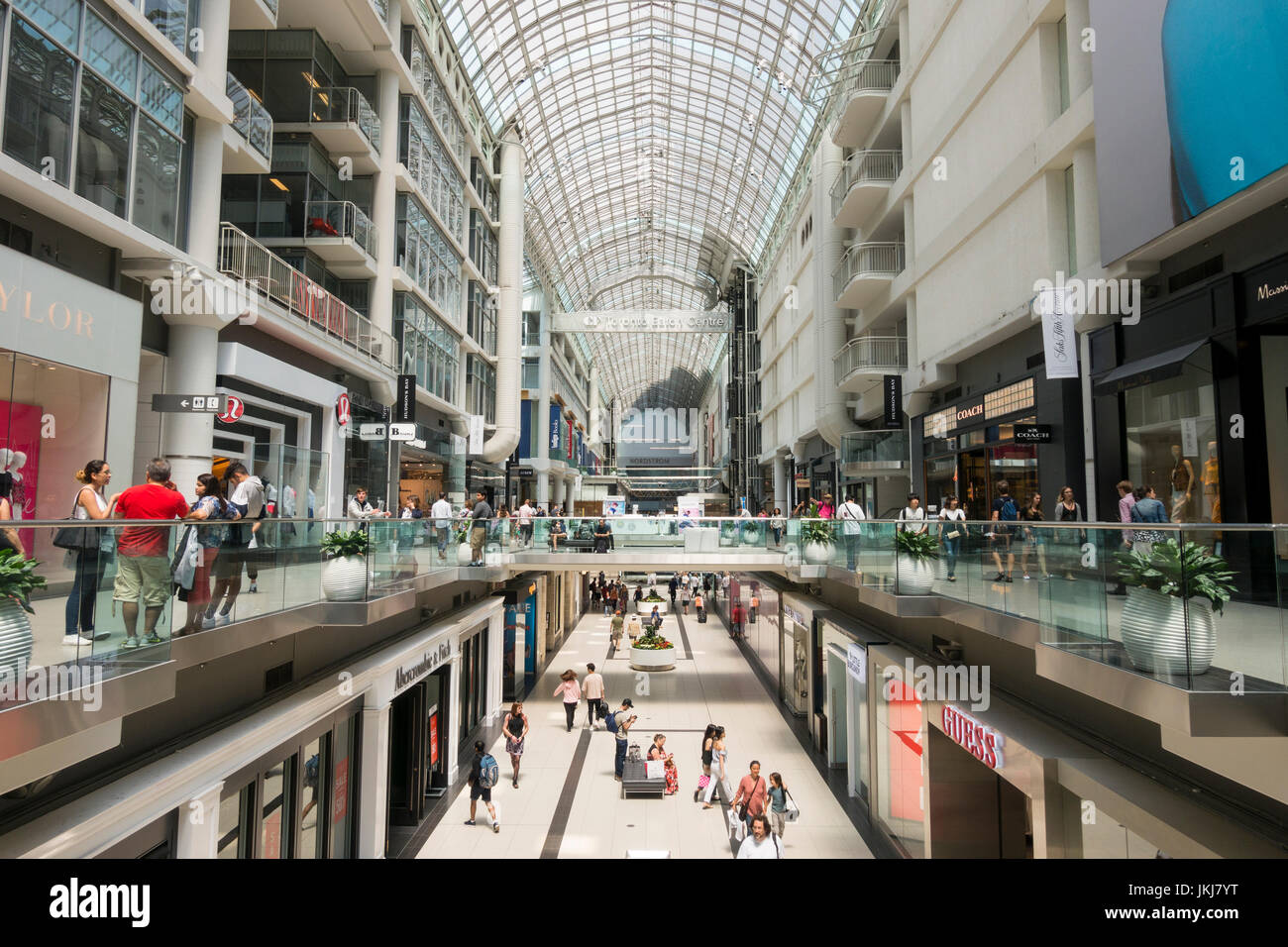 Visitors and shoppers in the Toronto Eaton Centre a shopping centre and tourist stop on Yonge street in downtown Toronto Ontario Canada Stock Photo