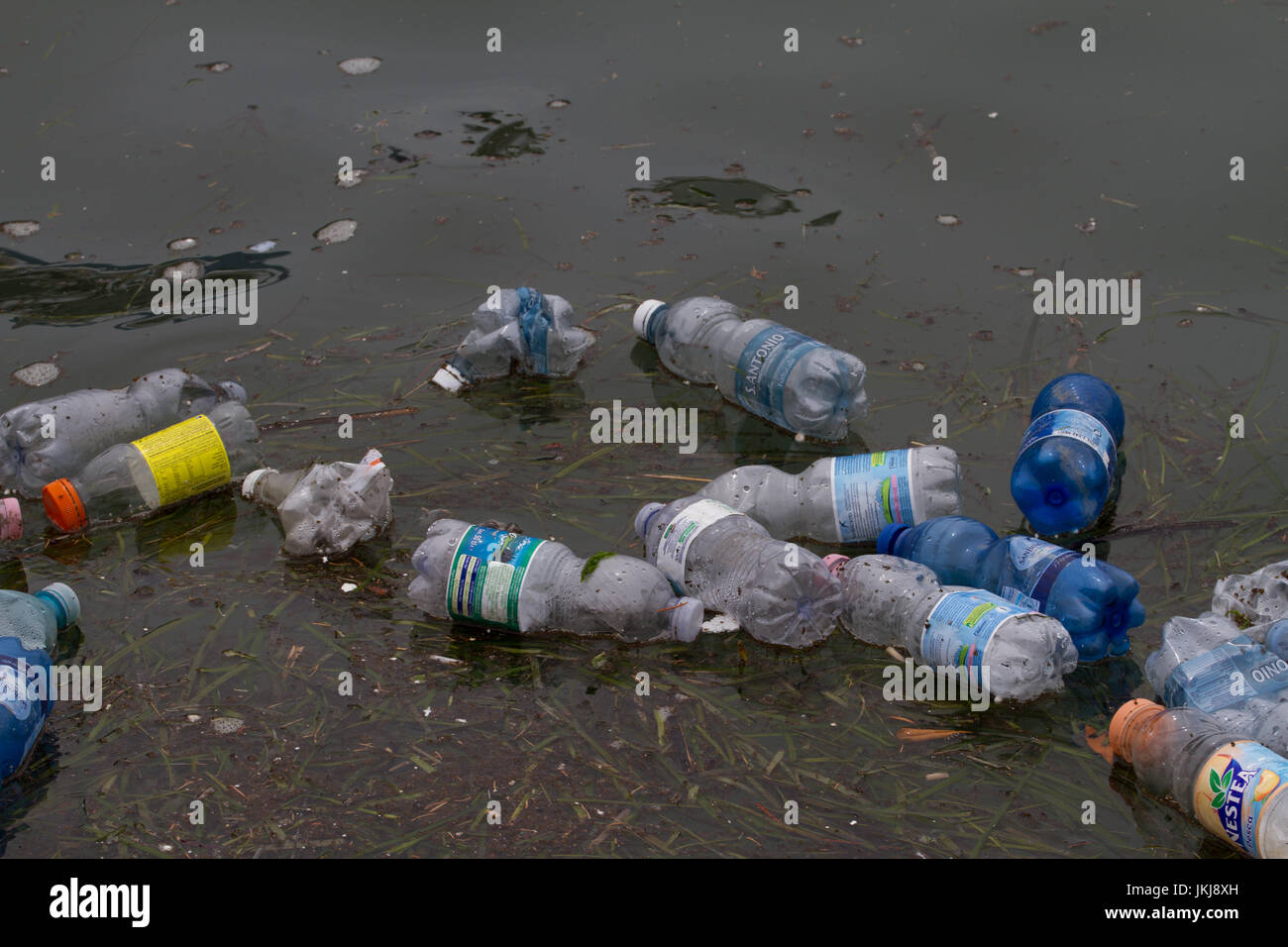 Plastic bottles floating in water. Venice. Italy Stock Photo Alamy