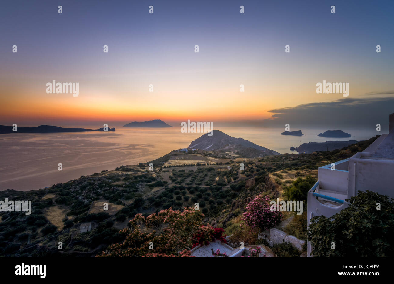 Scenic sunset as seen from Plaka town in Milos island, Greece Stock Photo