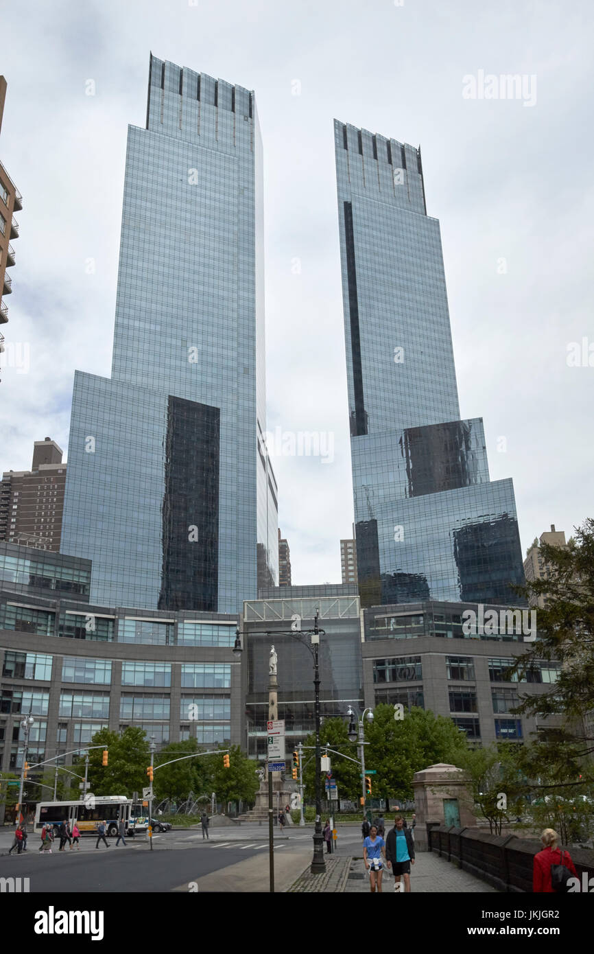 looking along central park south towards columbus circle and the time warner center New York City USA Stock Photo