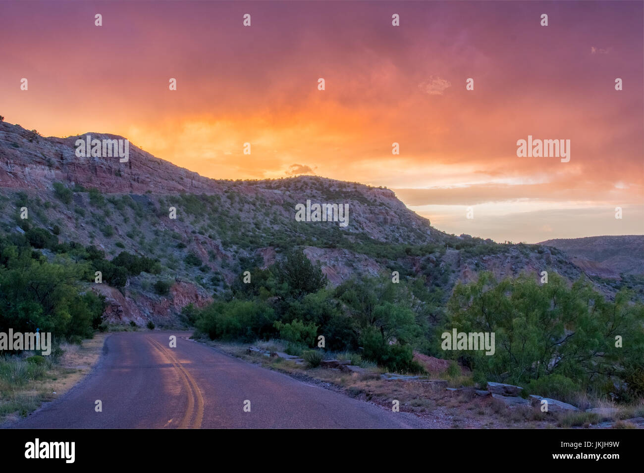 Sunset and Road at Palo Duro in west Texas Stock Photo