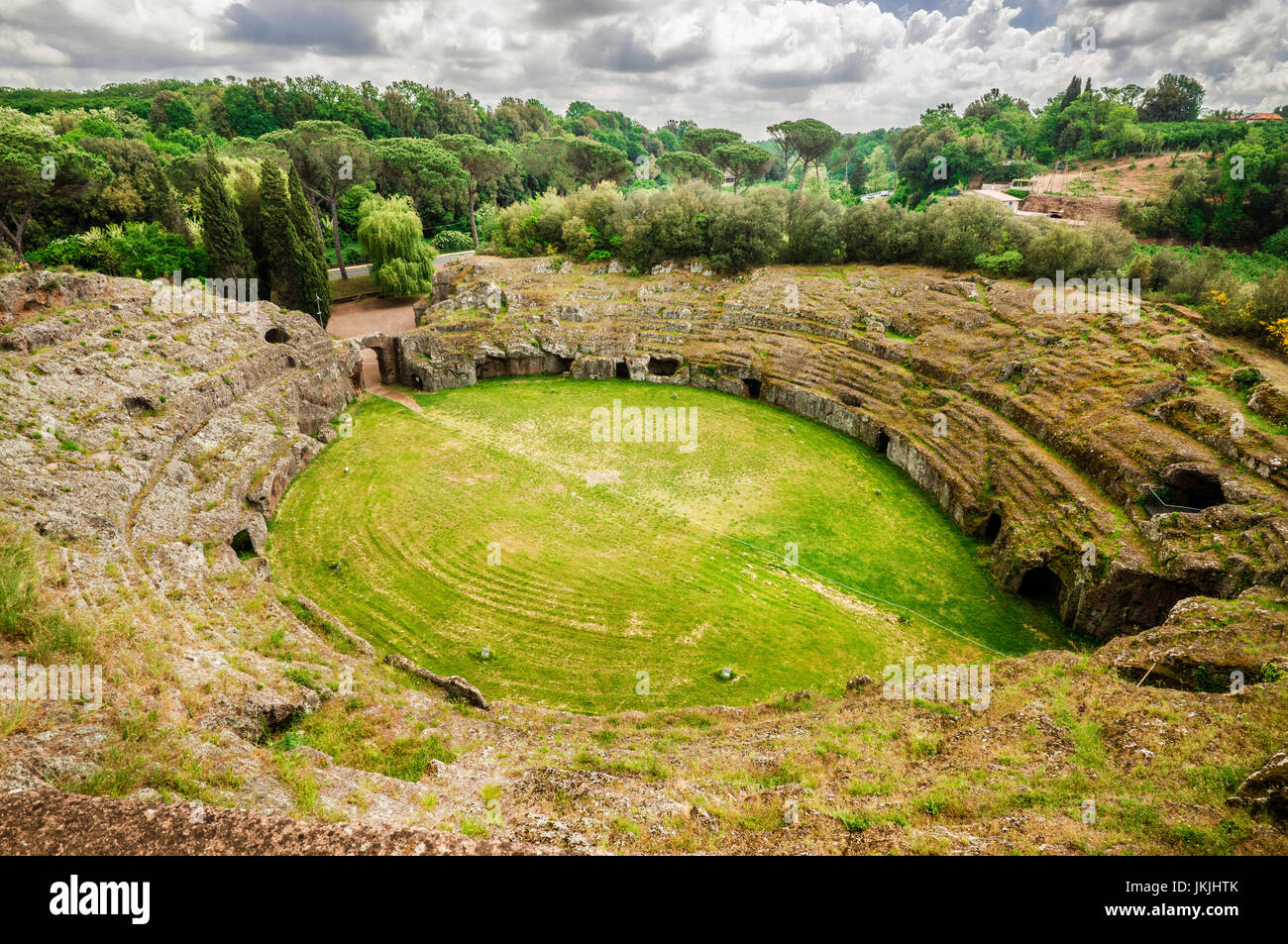 Ancient roman tuff stone amphitheater in the town of Sutri, near Rome Stock Photo